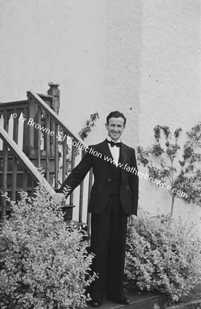 PRIEST AT PAROCHIAL HOUSE